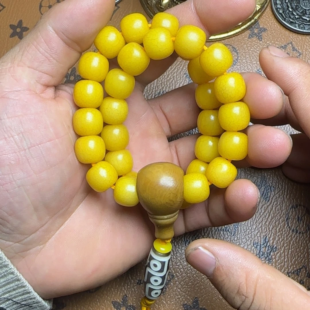 垃***圾柏香籽/百香籽吊坠