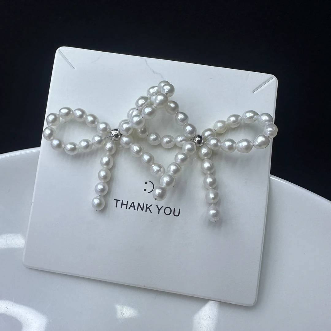 怀秋·强光蝴蝶结银针淡水珍珠耳钉