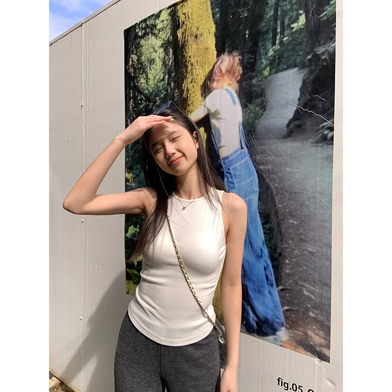 王少女的店【现】米白色个性圆领无袖背心春夏季辣妹上衣 D29875S51