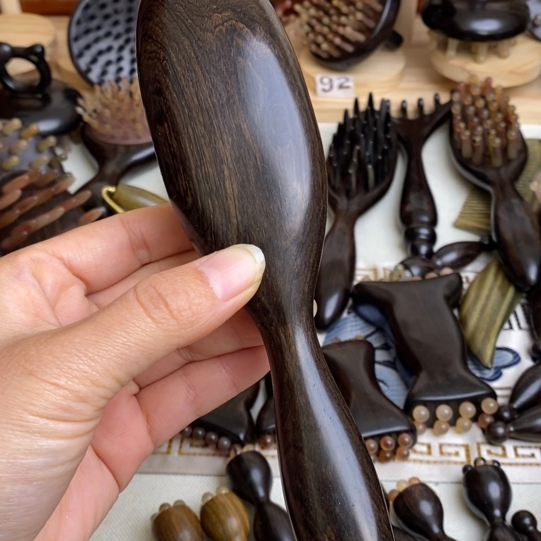 瑕疵紫光檀按摩梳子梳理