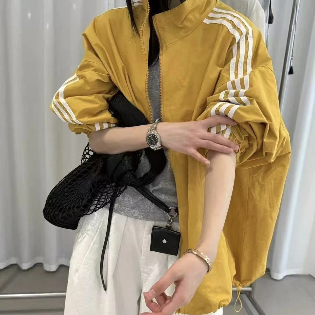 3865欧洲站早春新款欧货刺绣字母笑脸拼条纹立领休闲冲锋衣外套女