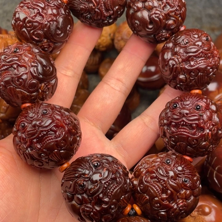 刘***根橄榄核吊坠橄榄核