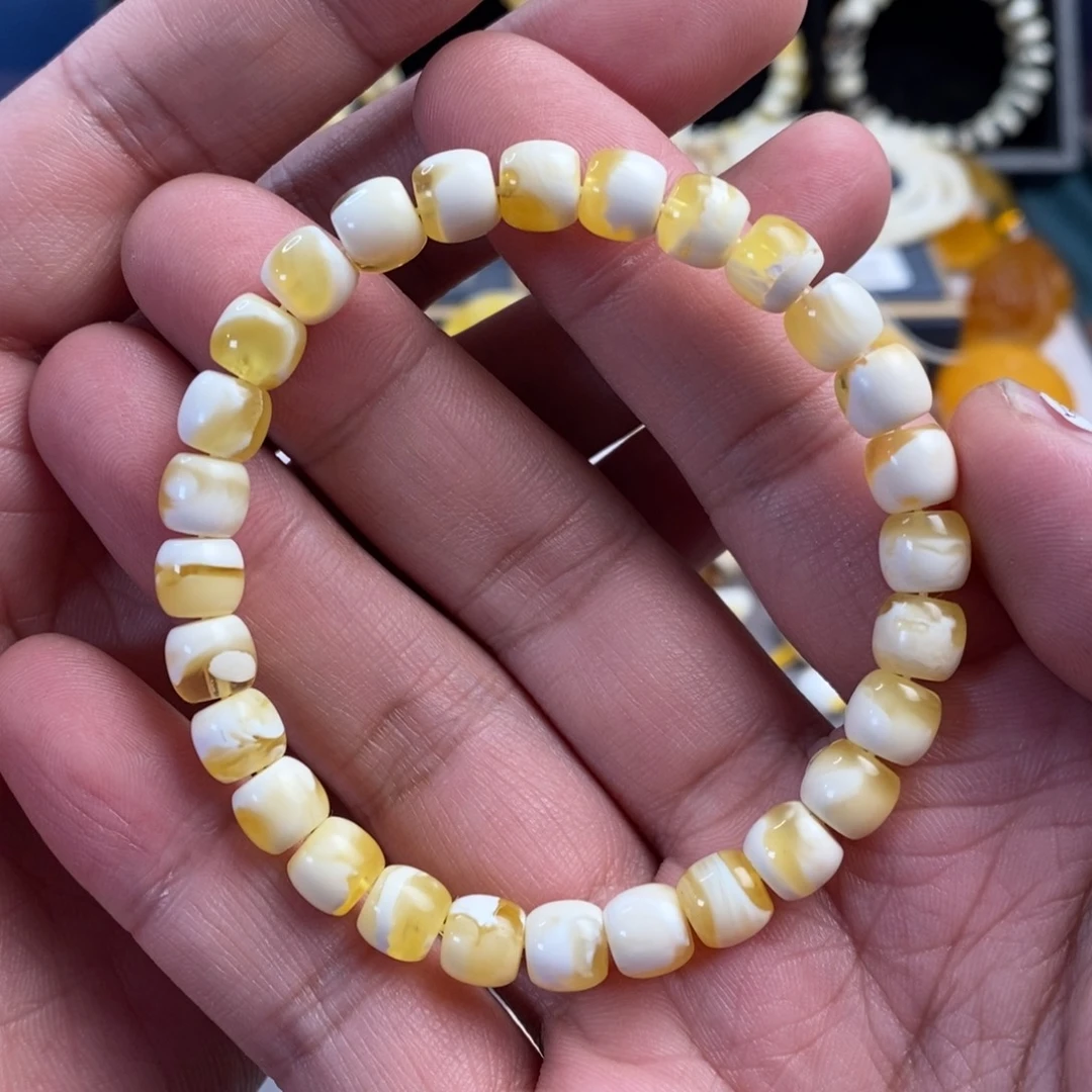 琥珀未镶嵌裸石7.6mm金瓷白