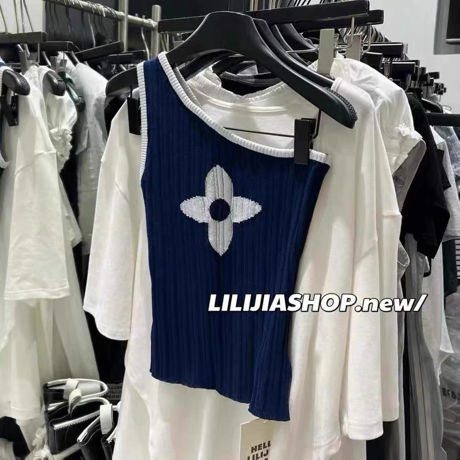 橙路【 韩系太太阳花斜肩背心】