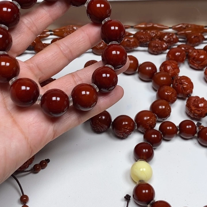 天***装橄榄核手持手串脖挂