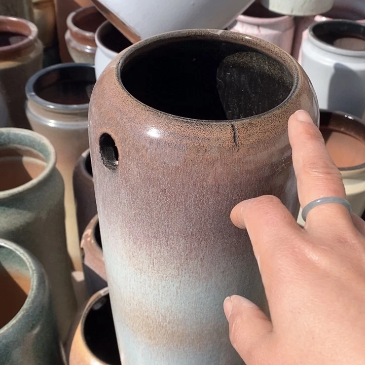 紫砂花盆打孔瑕大……