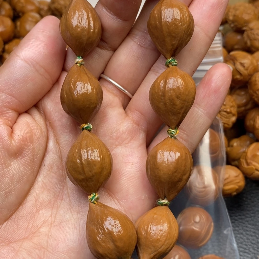 橄榄核手串三花素核