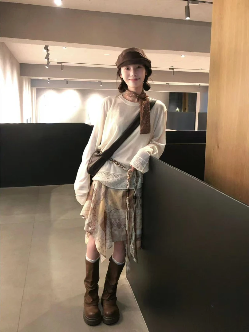 2025秋季新款镂空拼接设计感针织衫宽松休闲长袖上衣搭半身裙套装