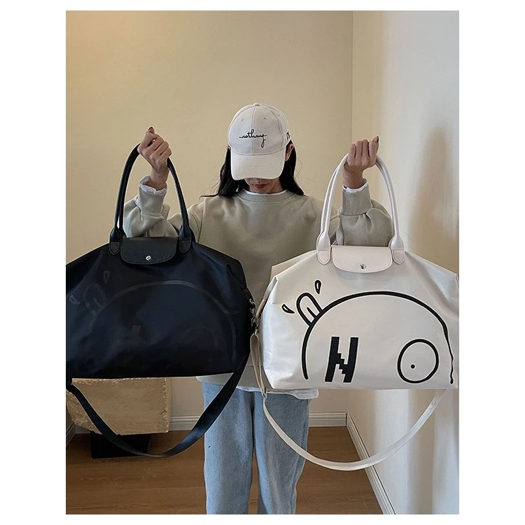 新款男单肩出差旅行包大容量学生逛街购物行李袋女手提健身运动包