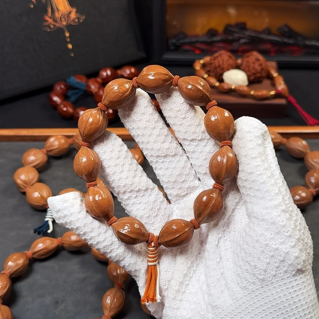 1.6*2.4小尺寸精致原生态梅林铁核手串