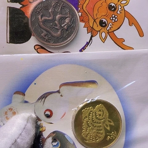 其他普通金属一轮龙章和兔章，，，，，，