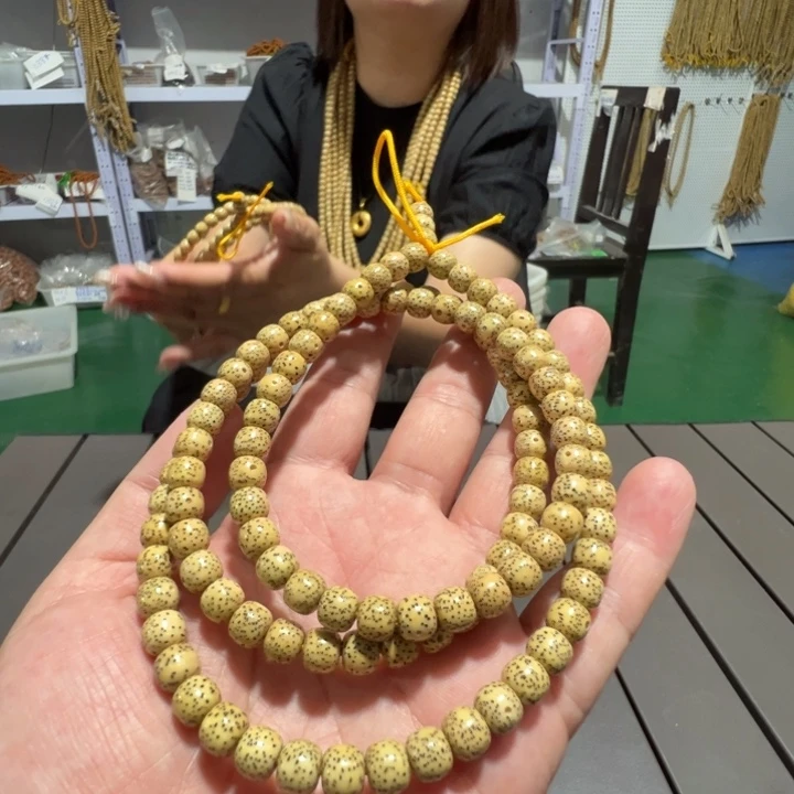 星月菩提吊坠鸡油黄8×7老型108颗