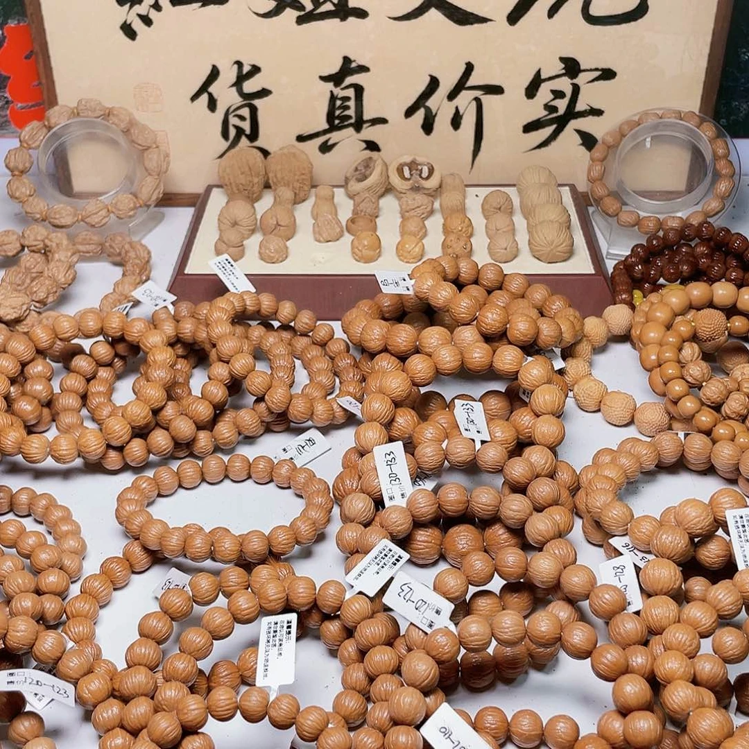雄***8猴头核桃手串元宝