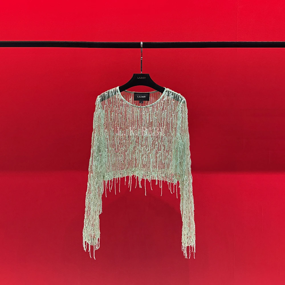 【L.K.BABY】玉骨风铃 时尚动感摇曳串珠流苏碧水波冰透衫