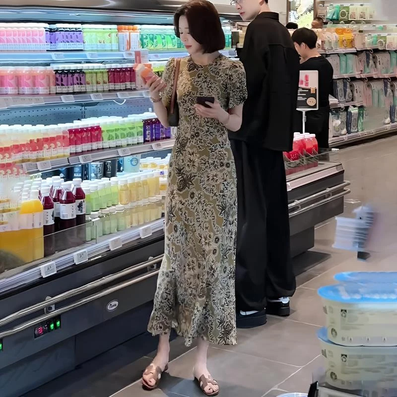 【北野花园】45°斜裁油画晕染花卉连衣裙夏慵懒松弛感度假长裙子女