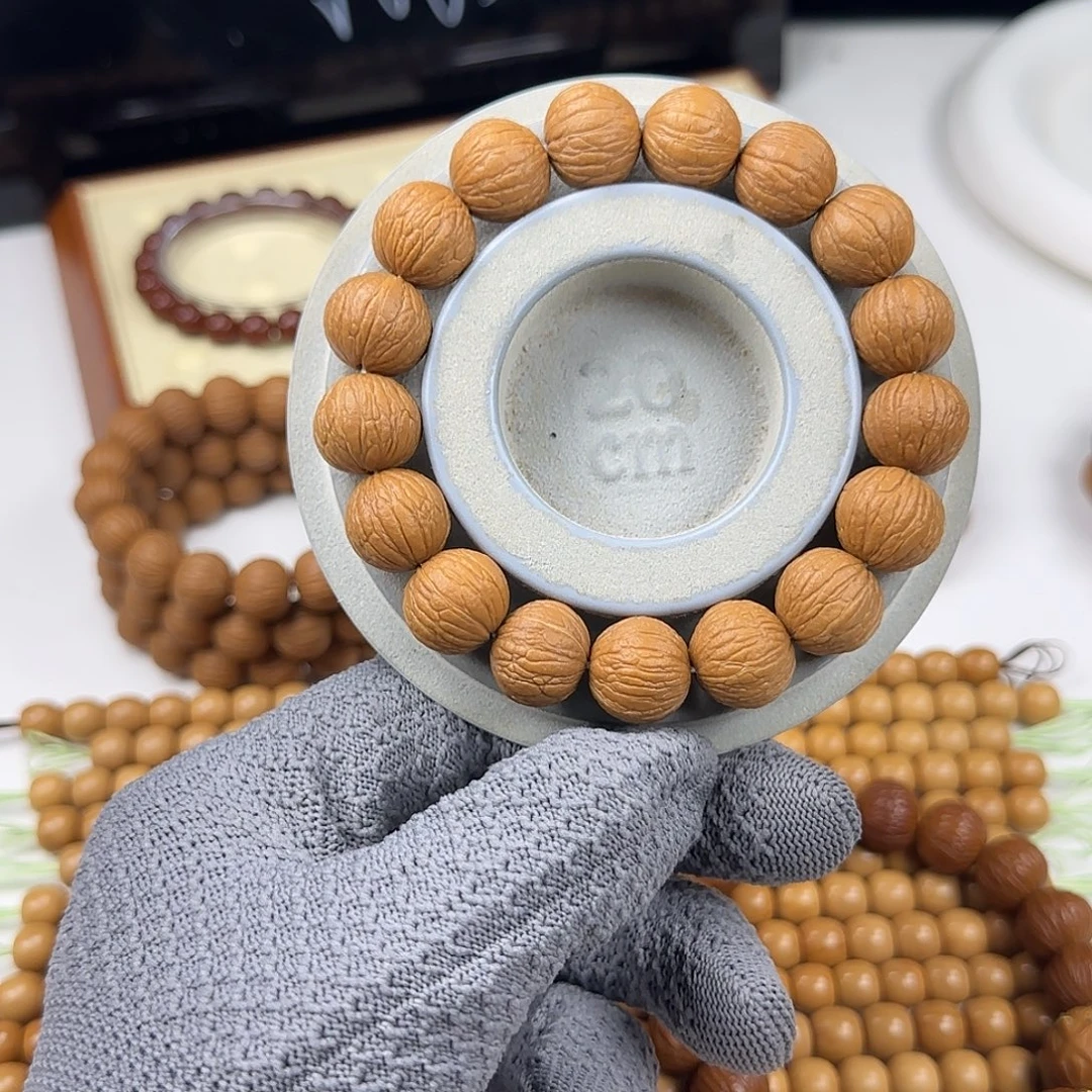 时***风猴头核桃吊坠凤羽