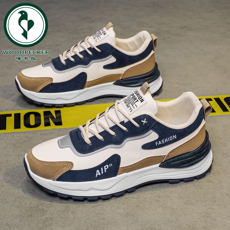 【正品】啄木鸟休闲鞋运动休闲皮面防滑耐磨男士百搭透气春季跑步
