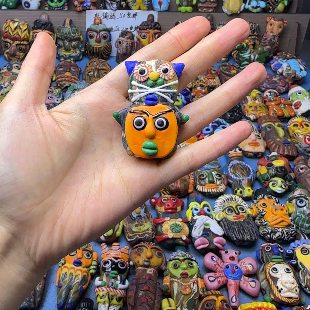 琉璃非金属人脸猫头娃