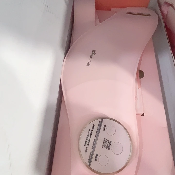 小熊暖腹加热按摩腰带。