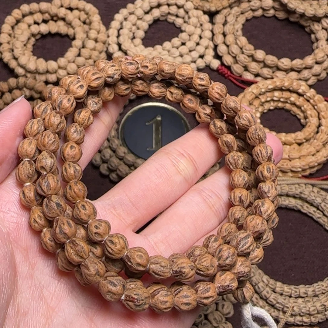 柏香籽/百香籽吊坠吾***夏