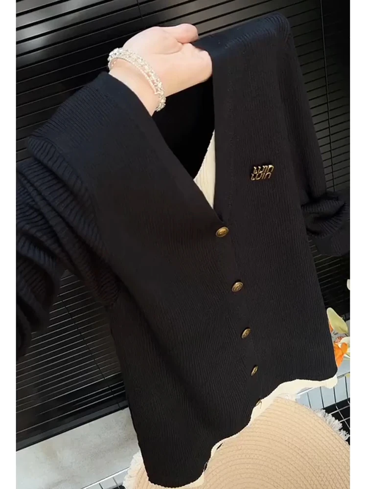 今年流行时尚穿搭女2025新款温柔风显瘦毛针织衫假两件长袖上衣潮