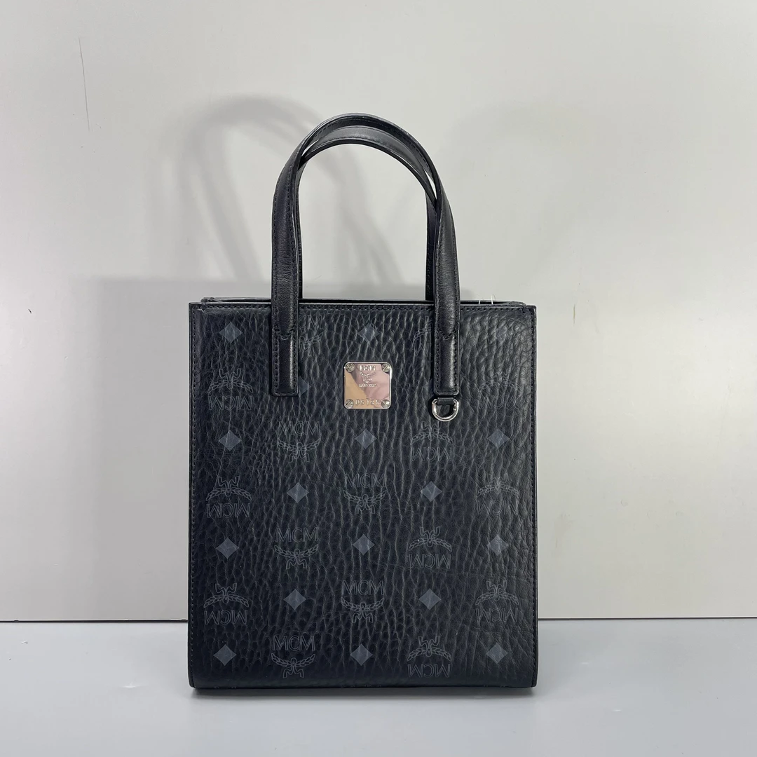 95新 MCM 媚姐/mcm黑色小号琴谱包19*22*8cmG050901