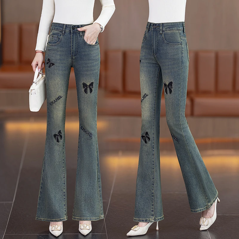 复古蓝炭黑色修身显瘦女秋冬季加绒加厚刺绣镶钻高腰微喇叭牛仔裤