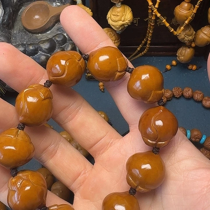 橄榄核吊坠啦啦啦啦