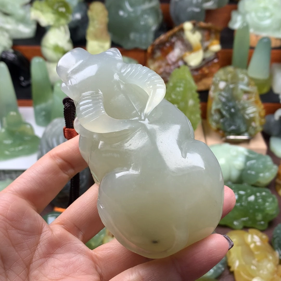 岫玉未镶嵌手把件