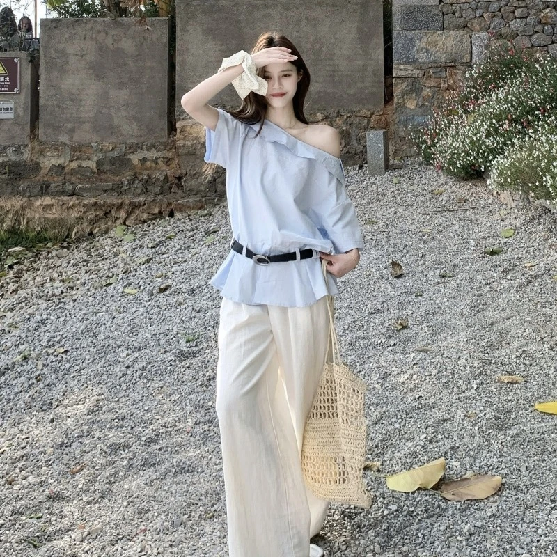 通勤显瘦2025夏季新款别致设计感斜肩蓝色显白短袖衬衣上衣配腰带