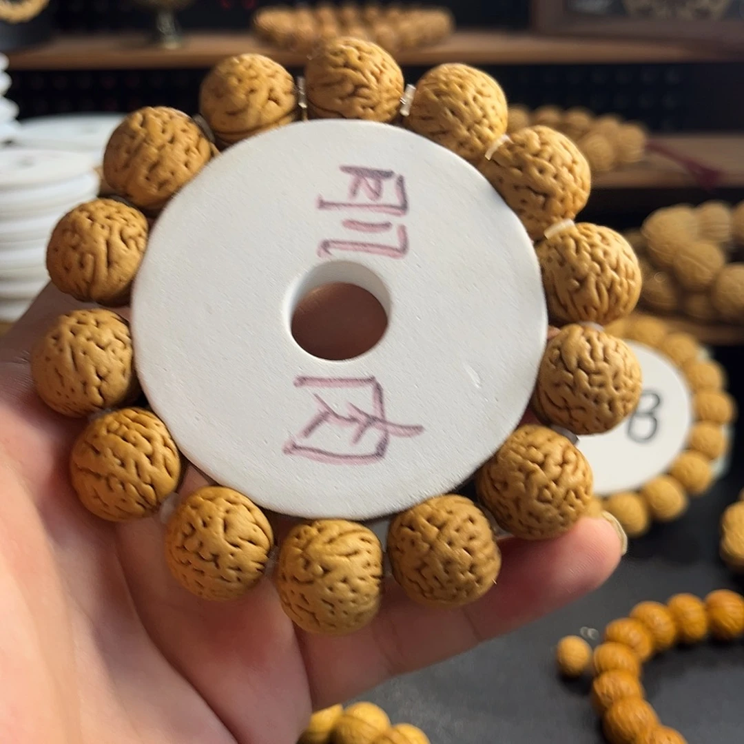 亚***P桃核吊坠盘锦肌肉17