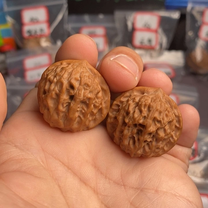 文玩核桃把件32金锭元宝有修