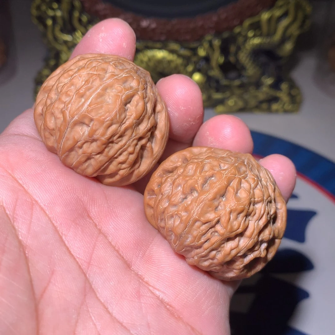 文玩核桃把件铁锤40寿桃