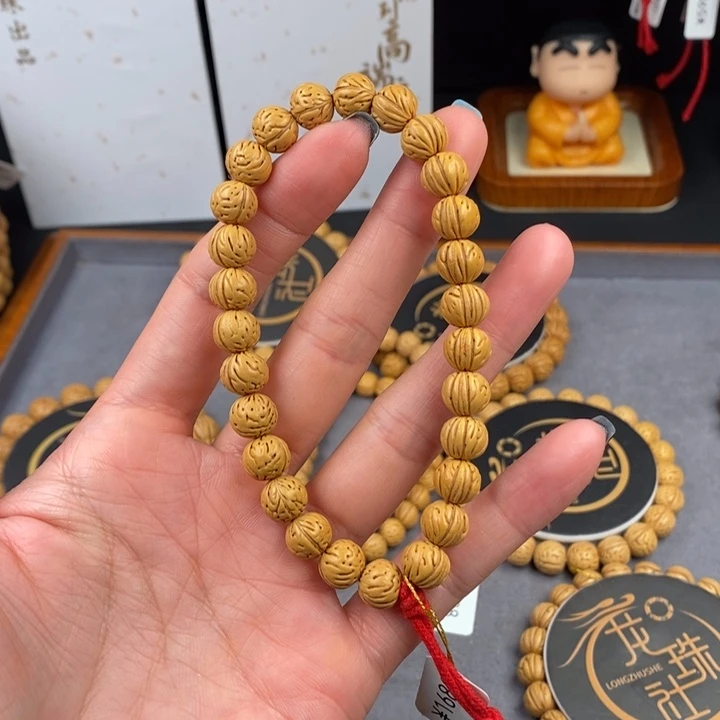 北***。手串桃核凤 0.95 抛光（尺寸误差0.5之间）