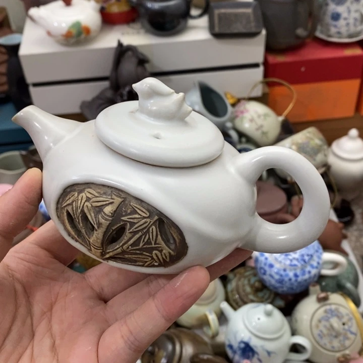 陶瓷艺术品及陶瓷产品壶带****人