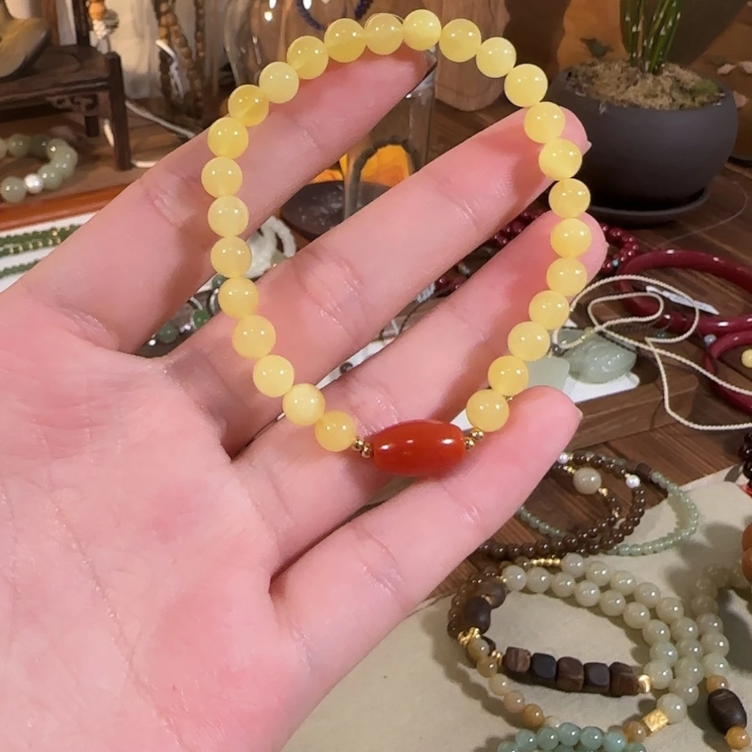 馥***余银S925天然无优化鸡油黄