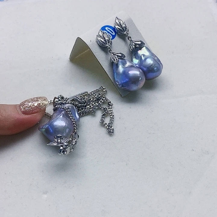 银S925镶嵌耳饰淡水珍珠溪*?