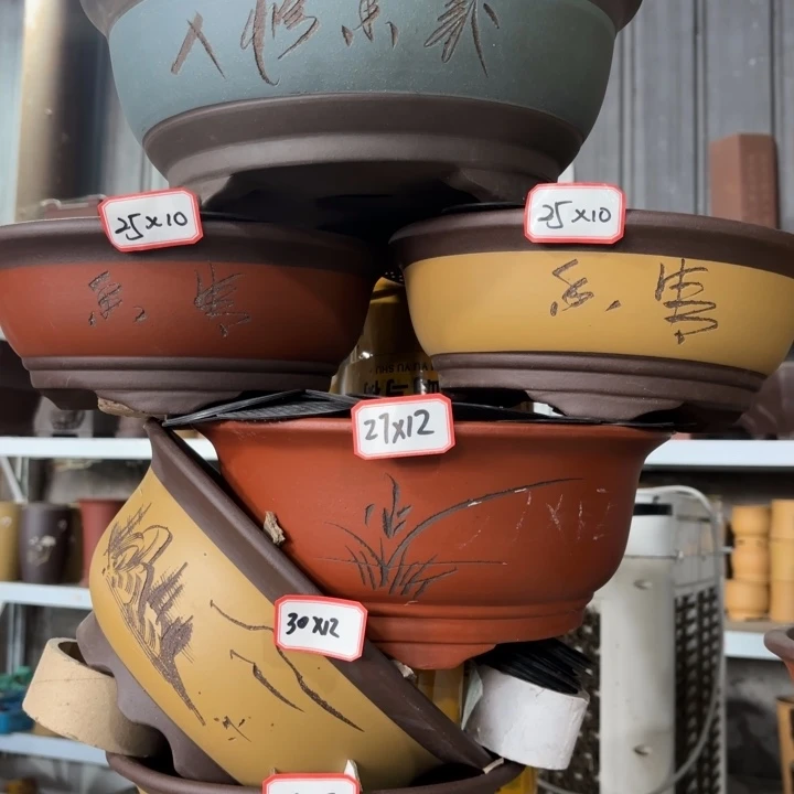 紫砂花盆100-6。