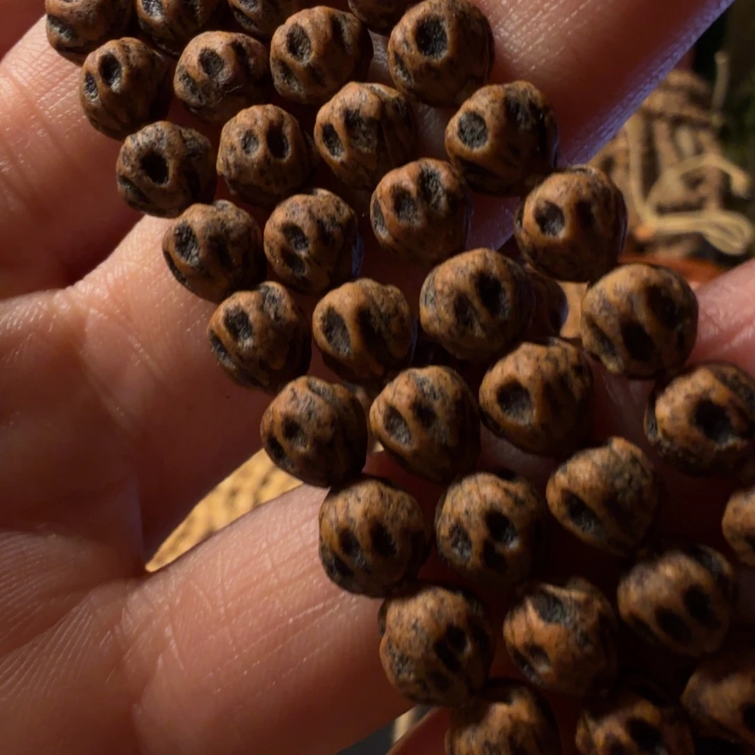 曼****柏香籽/百香籽吊坠