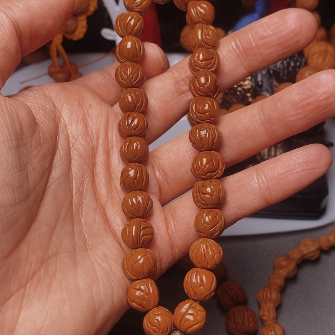 L***ᔉ吊坠桃核桃枭手持1