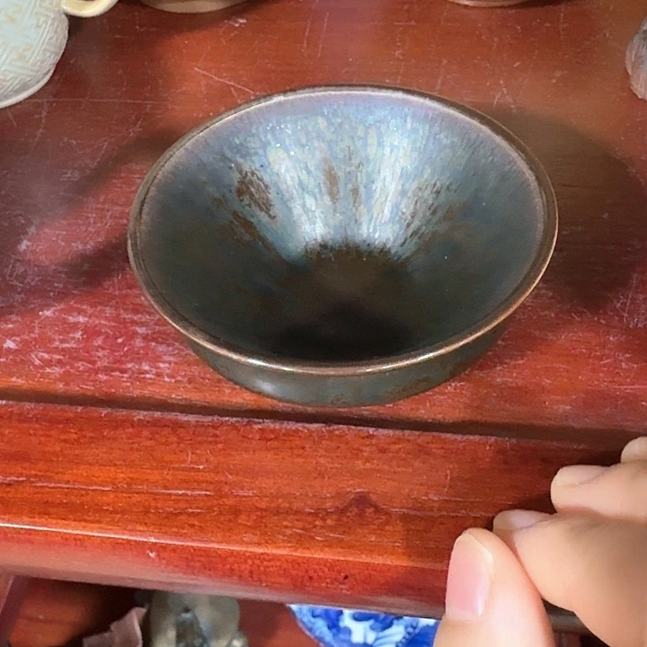 主人杯一个，瓷。。。品茗瓷