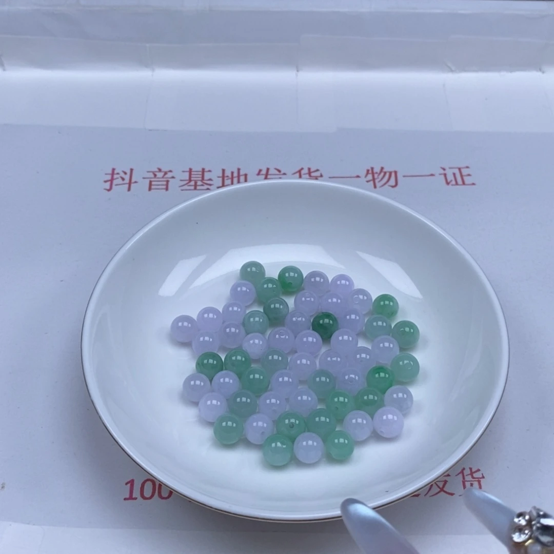 翡翠未镶嵌颈饰米****?翡翠散珠