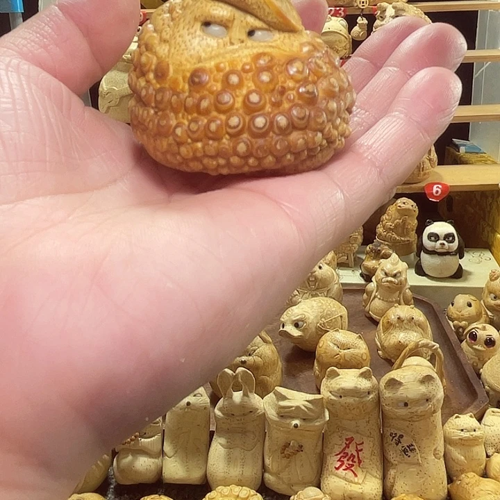 我***空竹竹根雕金蟾手把件