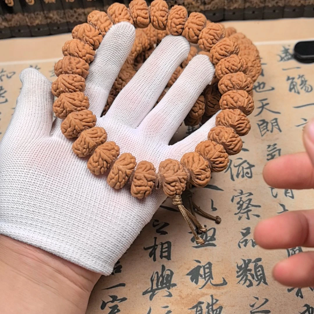吊坠桃核一道劲豹子头