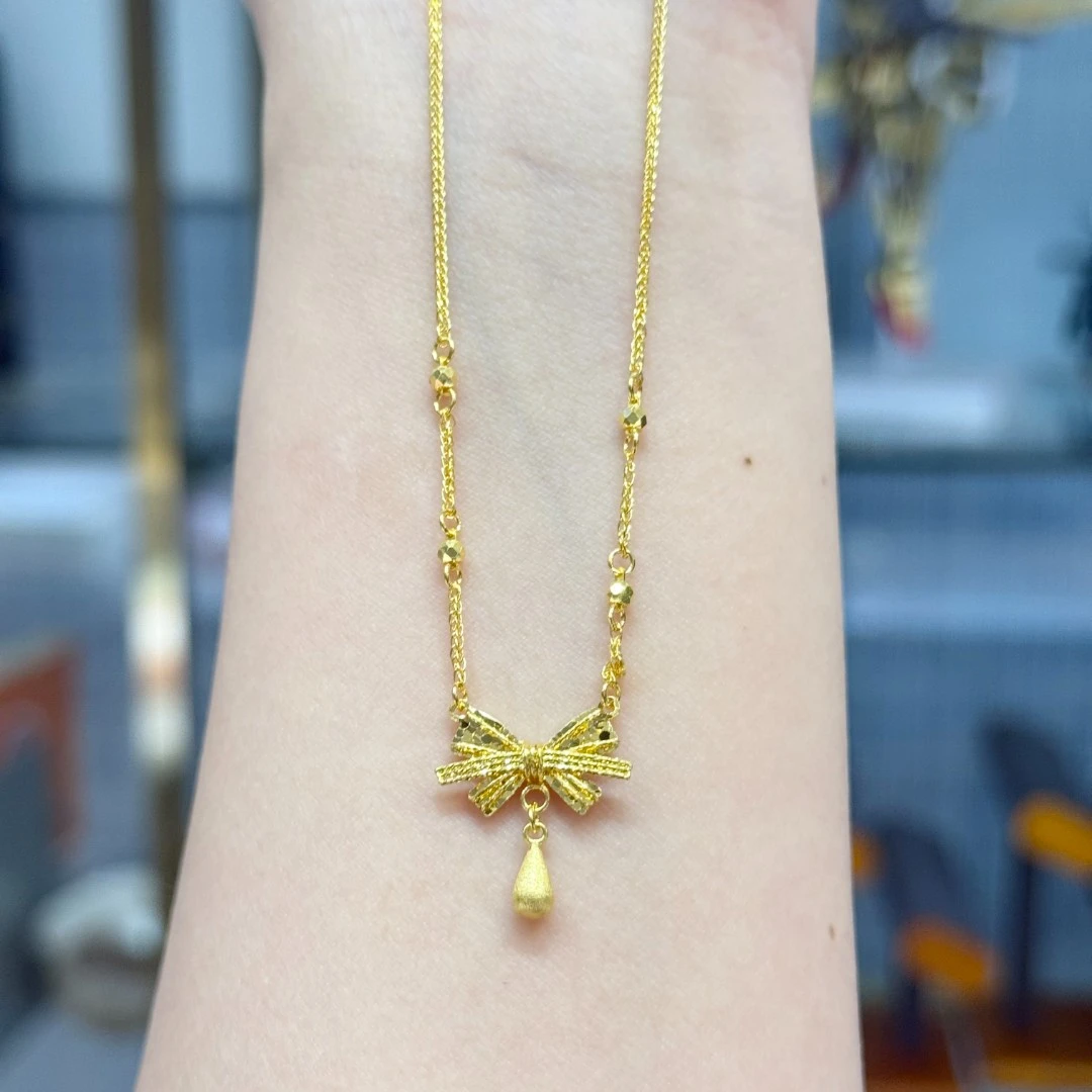 真真-X/Q【蝴蝶结水滴套链】足金999精工5G