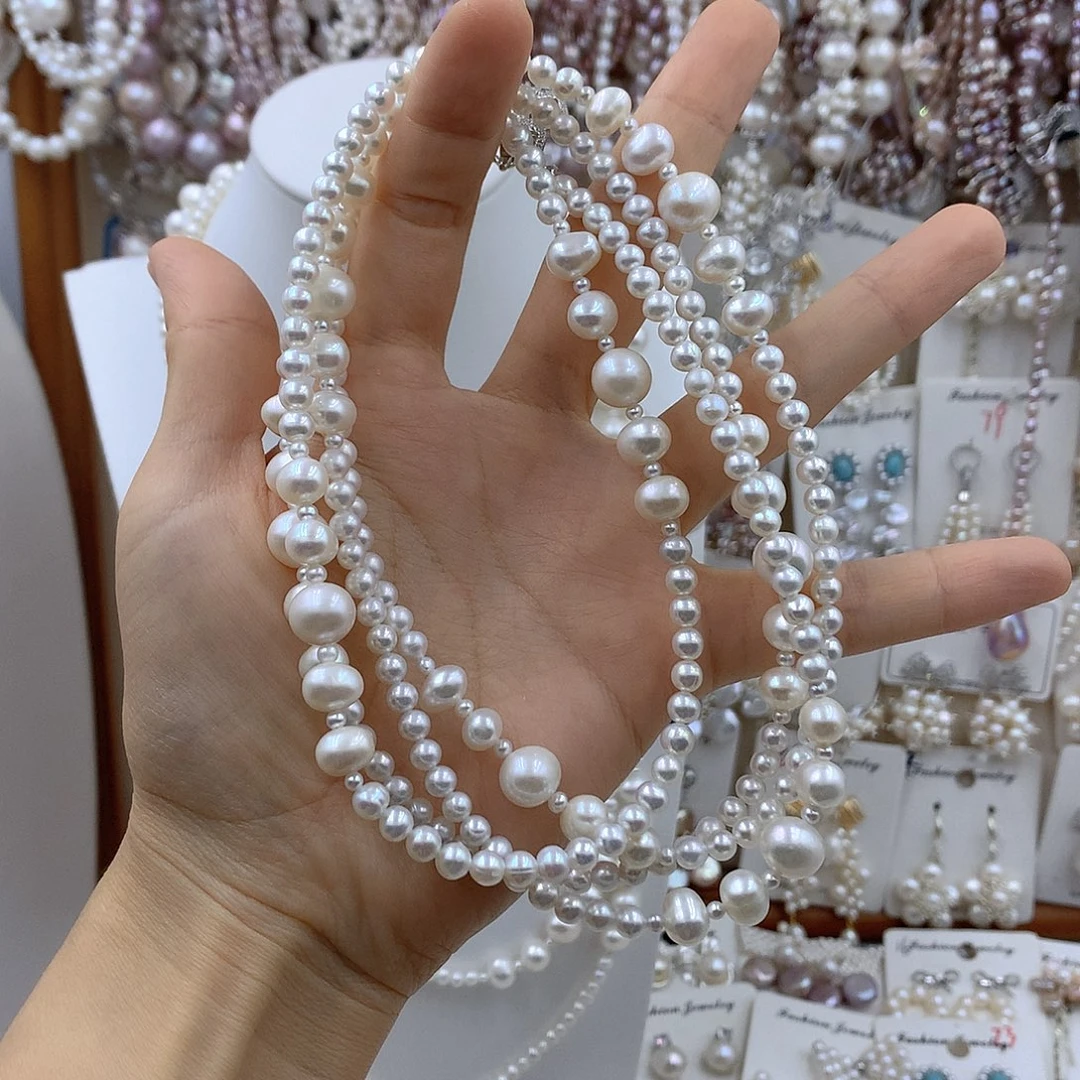 浅***然银S925镶嵌项链耳饰淡水珍珠