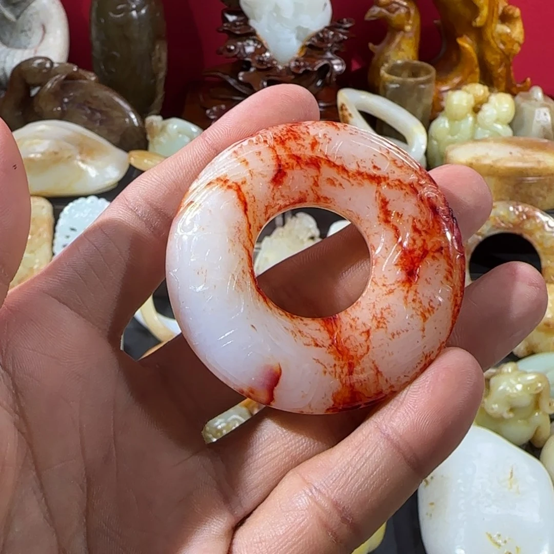 和田玉未镶嵌把件匿**探