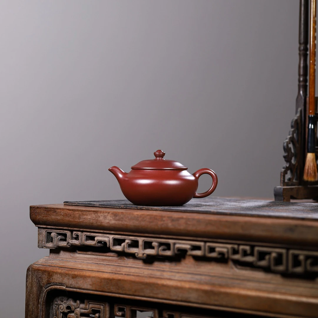 宜兴黄龙山原矿紫砂壶优质紫泥明炉壶球孔扁婴壶手工壶容量约180C