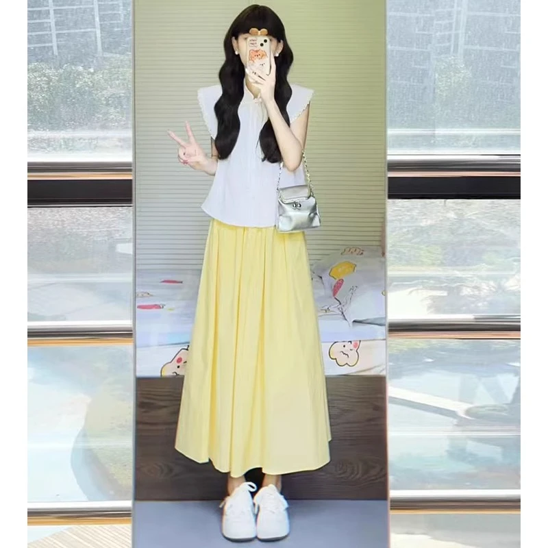 黄色半身裙女2025夏季新款高腰a字伞裙小个子遮胯显瘦百褶中长裙