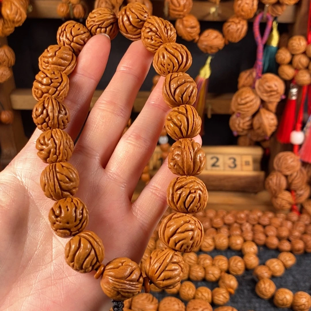 吊坠桃核桃枭手串